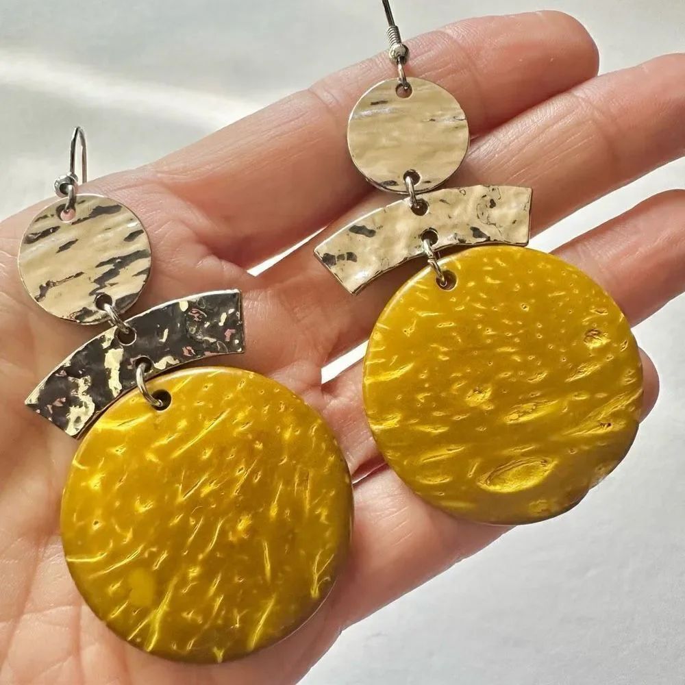 Yellow and silver tone statement earrings